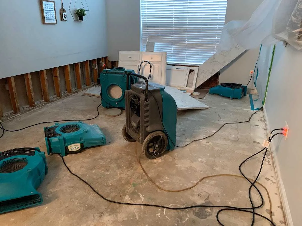 Dehumidifier in flood-cut room for Water Damage Restoration in Fort Riley